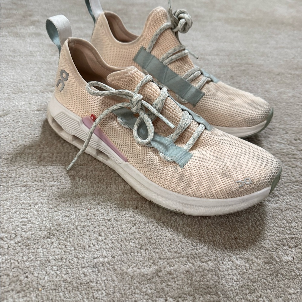 On Running Women's Lightweight Knit Sneakers in Beige with Mint Trim.